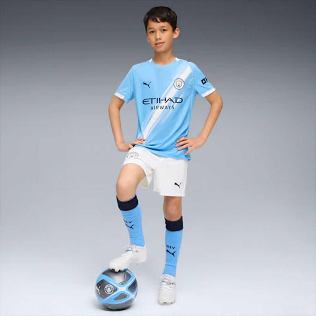 SHORT GARA HOME MANCHESTER CITY REPLICA 2025/26 JUNIOR
