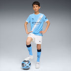 SHORT GARA HOME MANCHESTER CITY REPLICA 2025/26 JUNIOR