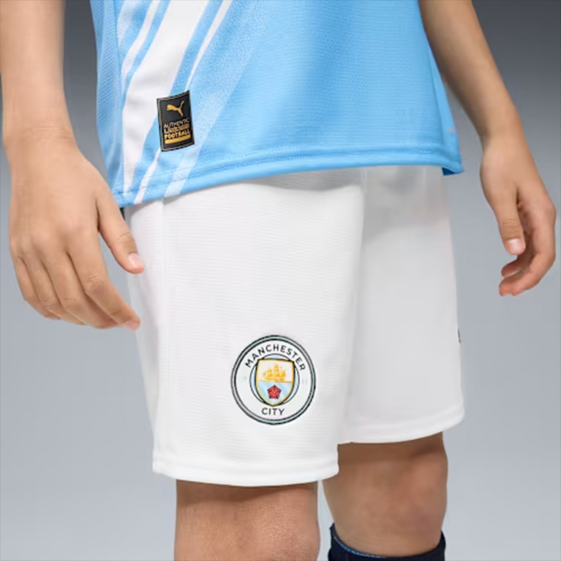 SHORT GARA HOME MANCHESTER CITY REPLICA 2025/26 JUNIOR