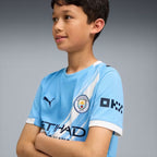 MAGLIA GARA HOME MANCHESTER CITY REPLICA 2025/26 JUNIOR